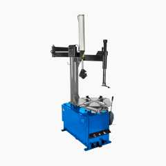 Tyre mounting machine with support arm